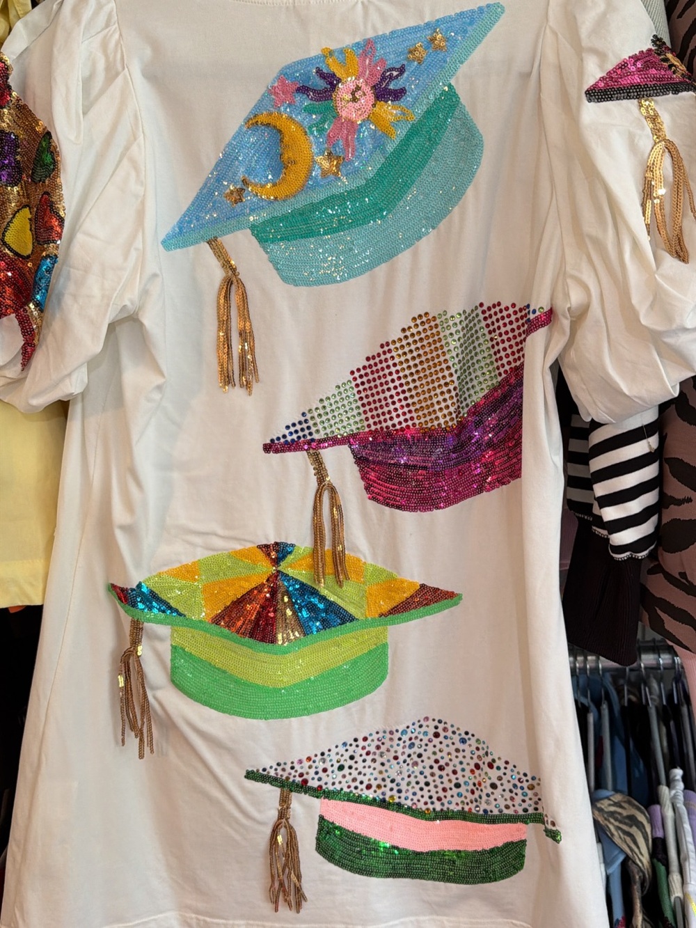 QUEEN OF SPARKLES White Short Sleeve Tee with Colorful Sequin Graduation Caps